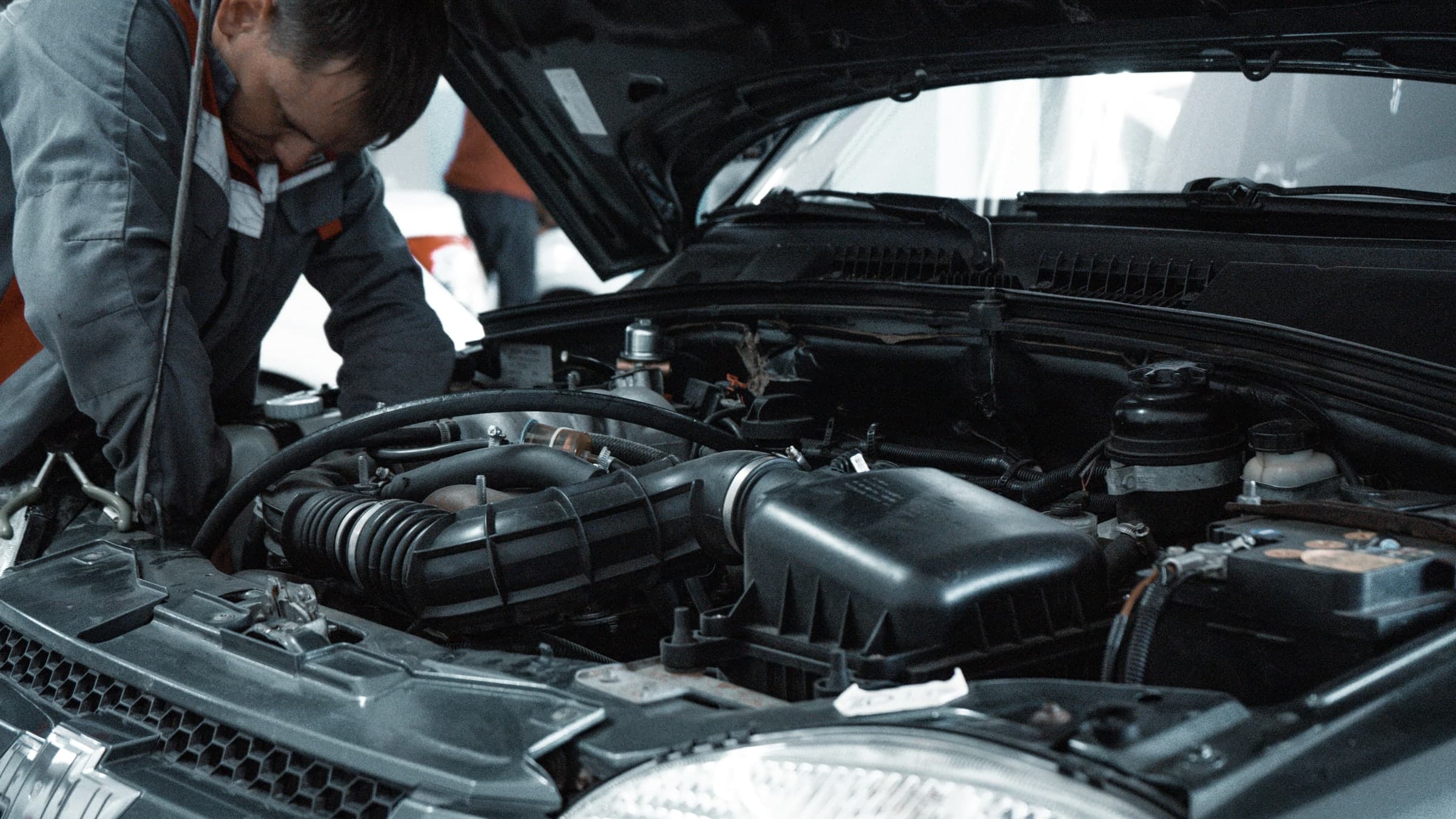 A mechanic working in the garage